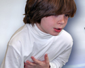 What causes wheezing? 